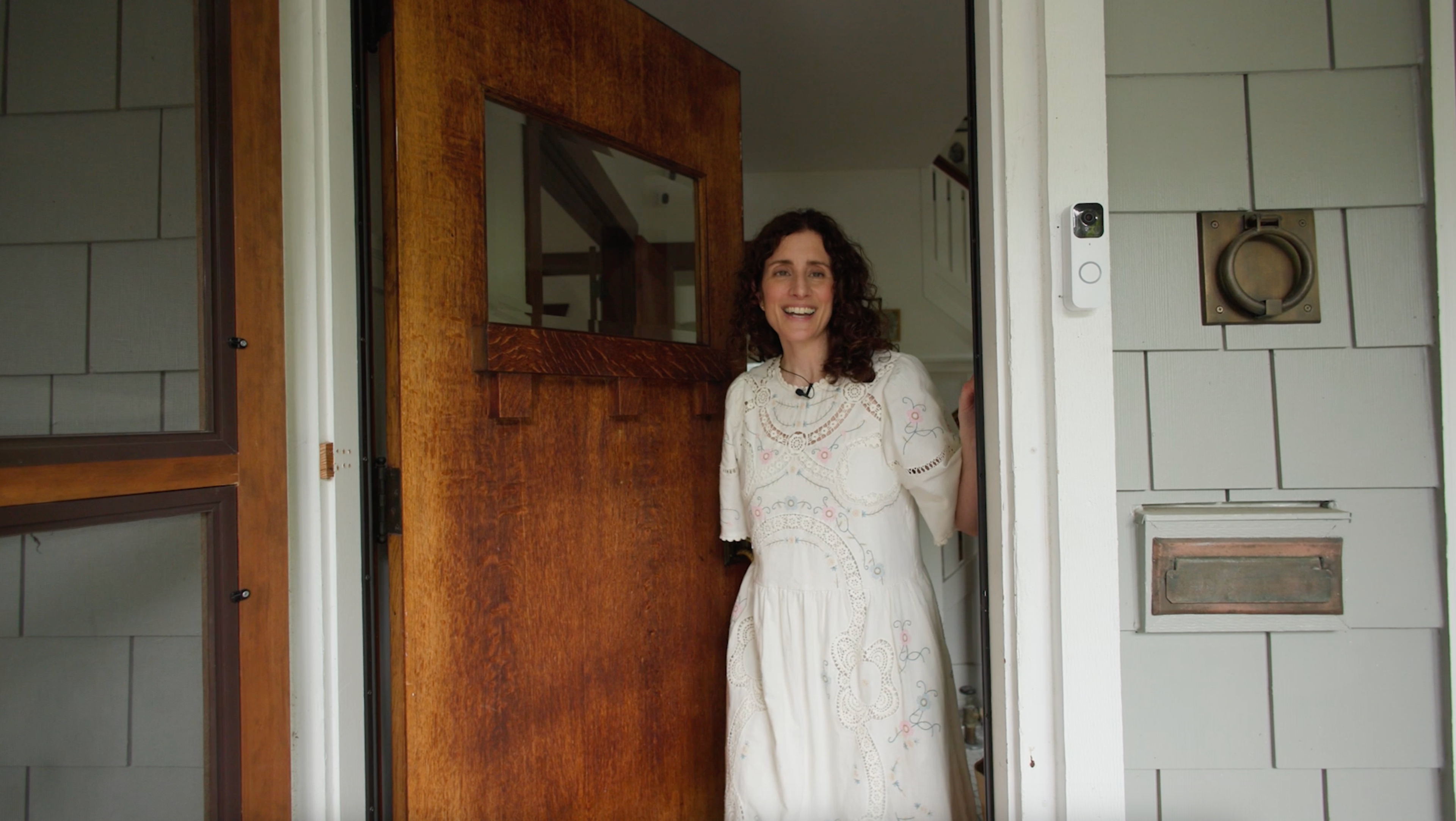 A classic historic front door with original hardware and ornate detailing.