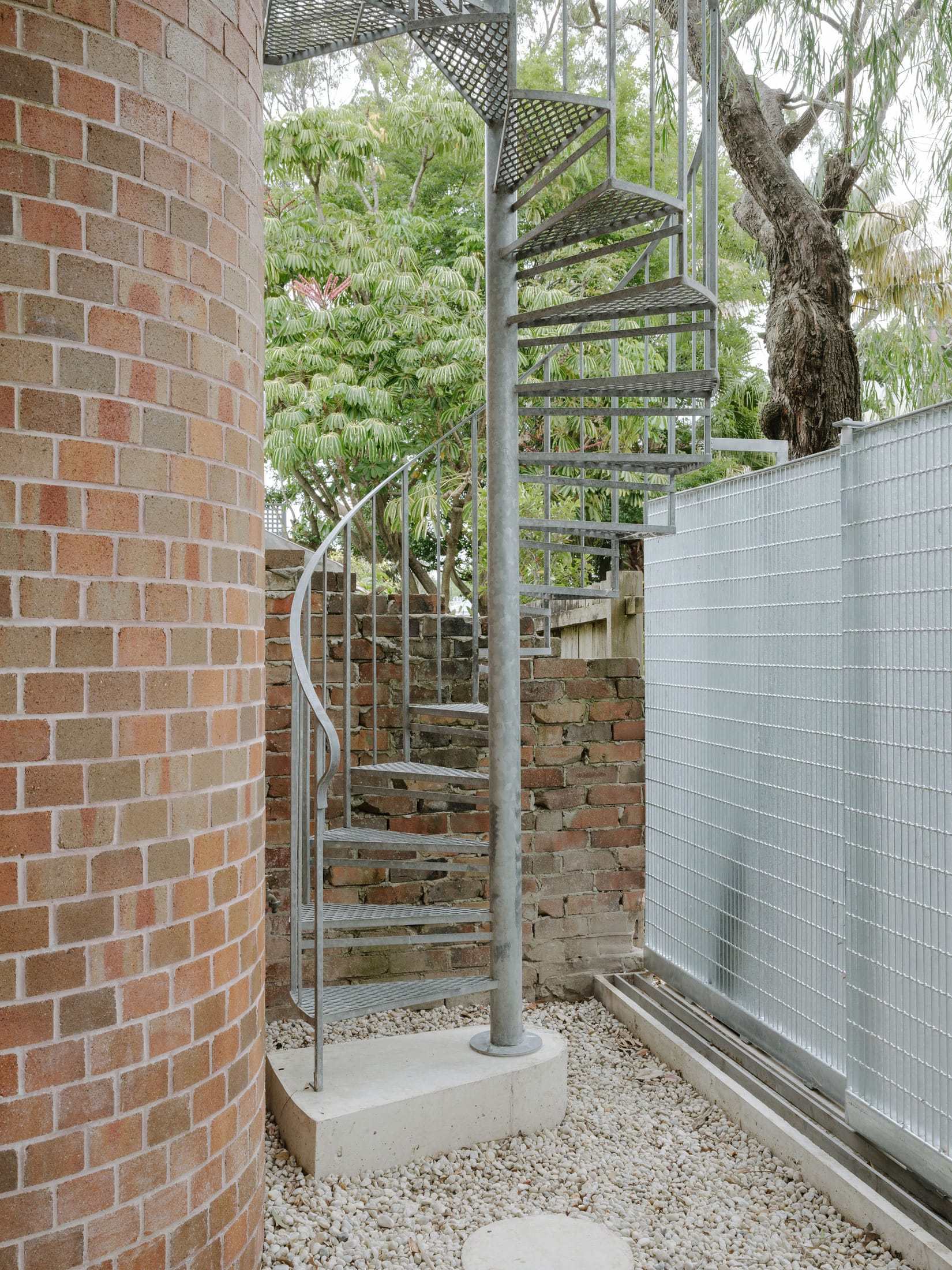 Close-up of a thin 8mm galvanised steel structural plate used in a narrow home renovation.
