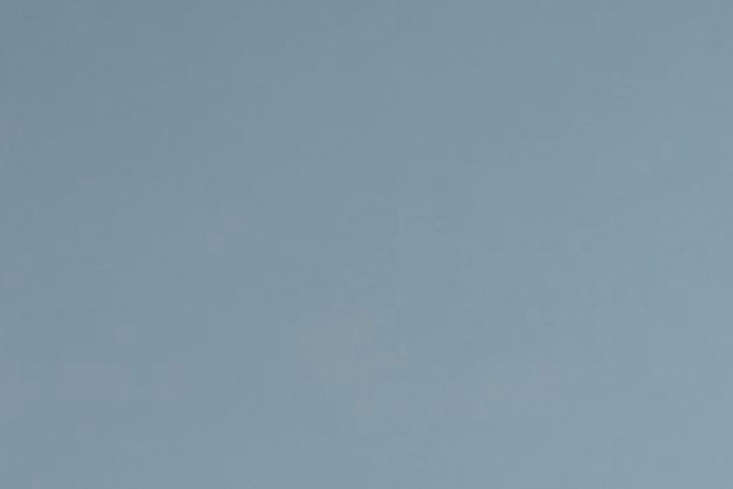 A gallon of Farrow & Ball Lulworth Blue paint against a neutral background.