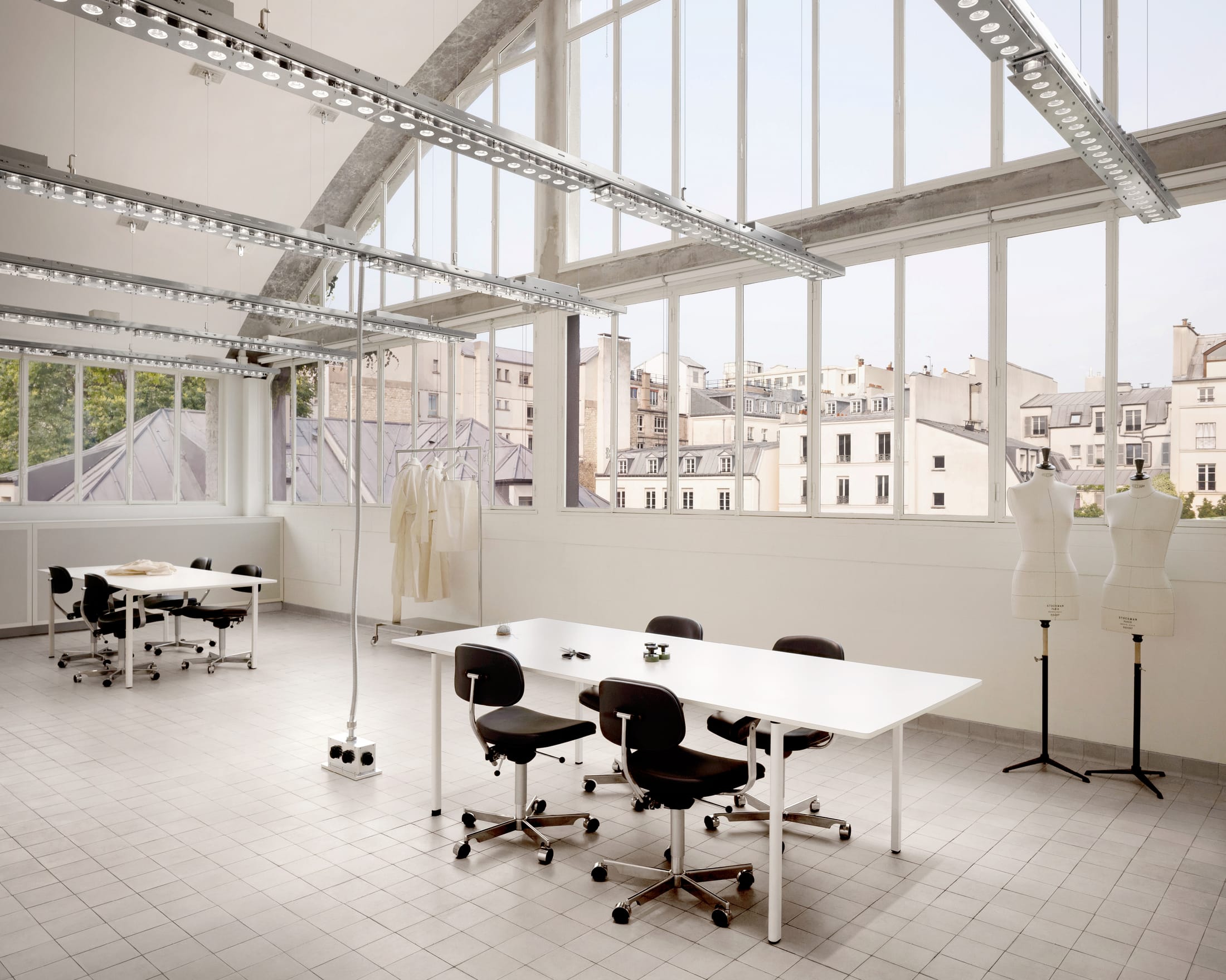 Interior shot showcasing original architectural details and vaulted ceilings of the former Gomenol laboratory.