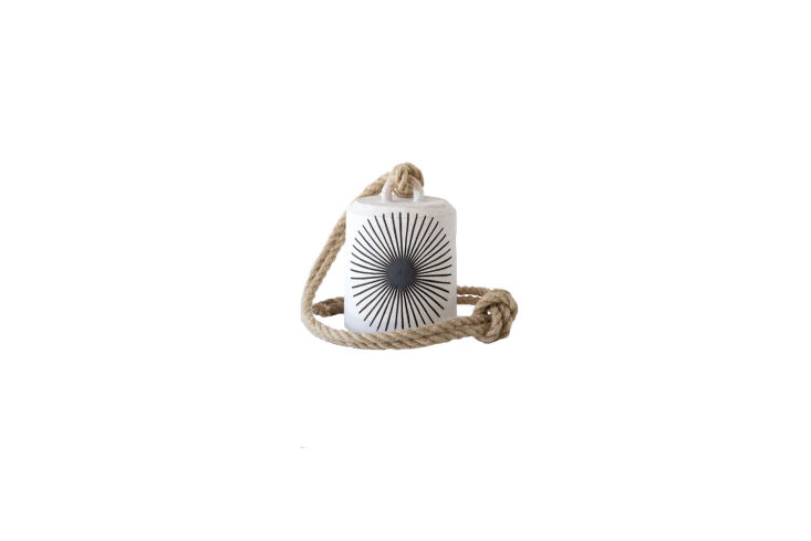 A ceramic M Quan Thrown Bell in a wide firefly design.