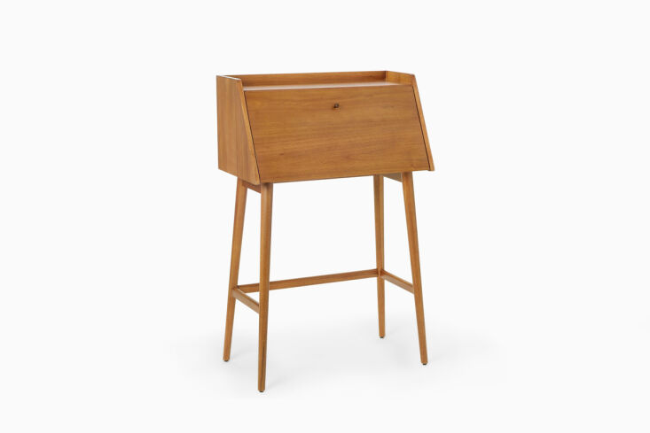 A petite Midcentury Mini Secretary Desk made of wood with tapered legs.