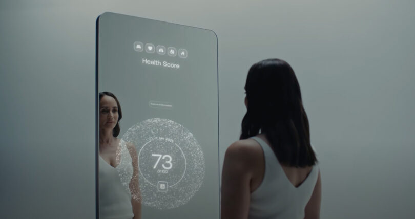A smart mirror displaying a comprehensive health score of 73 out of 100, providing a quick summary of the user's current physical status.