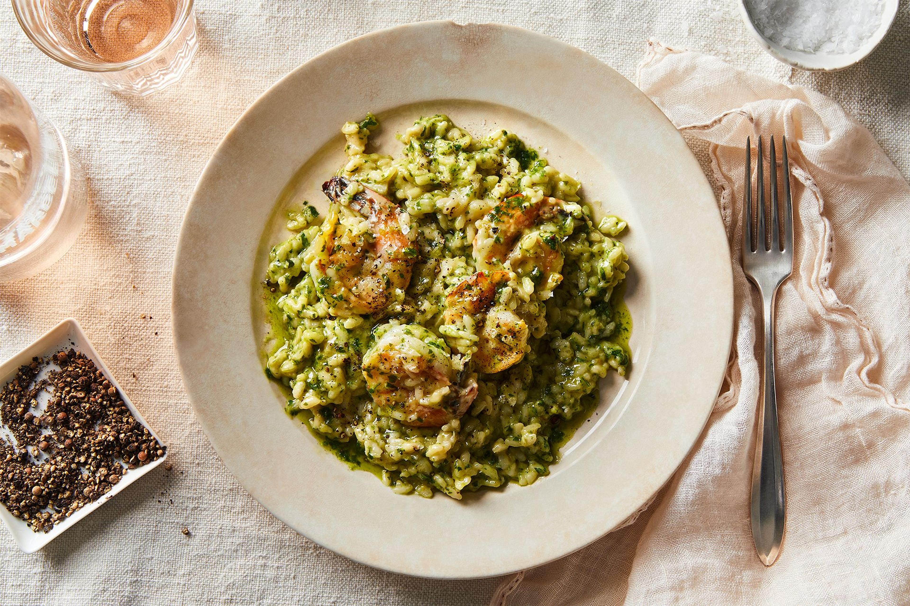 Plated shrimp pesto risotto with gourmet garnish