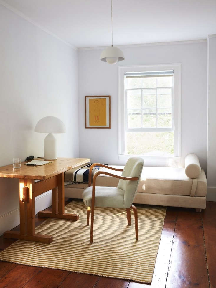 A wide shot of a serene study styled by Alexa Hotz for Remodelista.