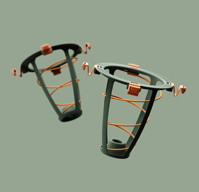 Close-up of two individual orange modular spring units from the MAZZU mattress system.