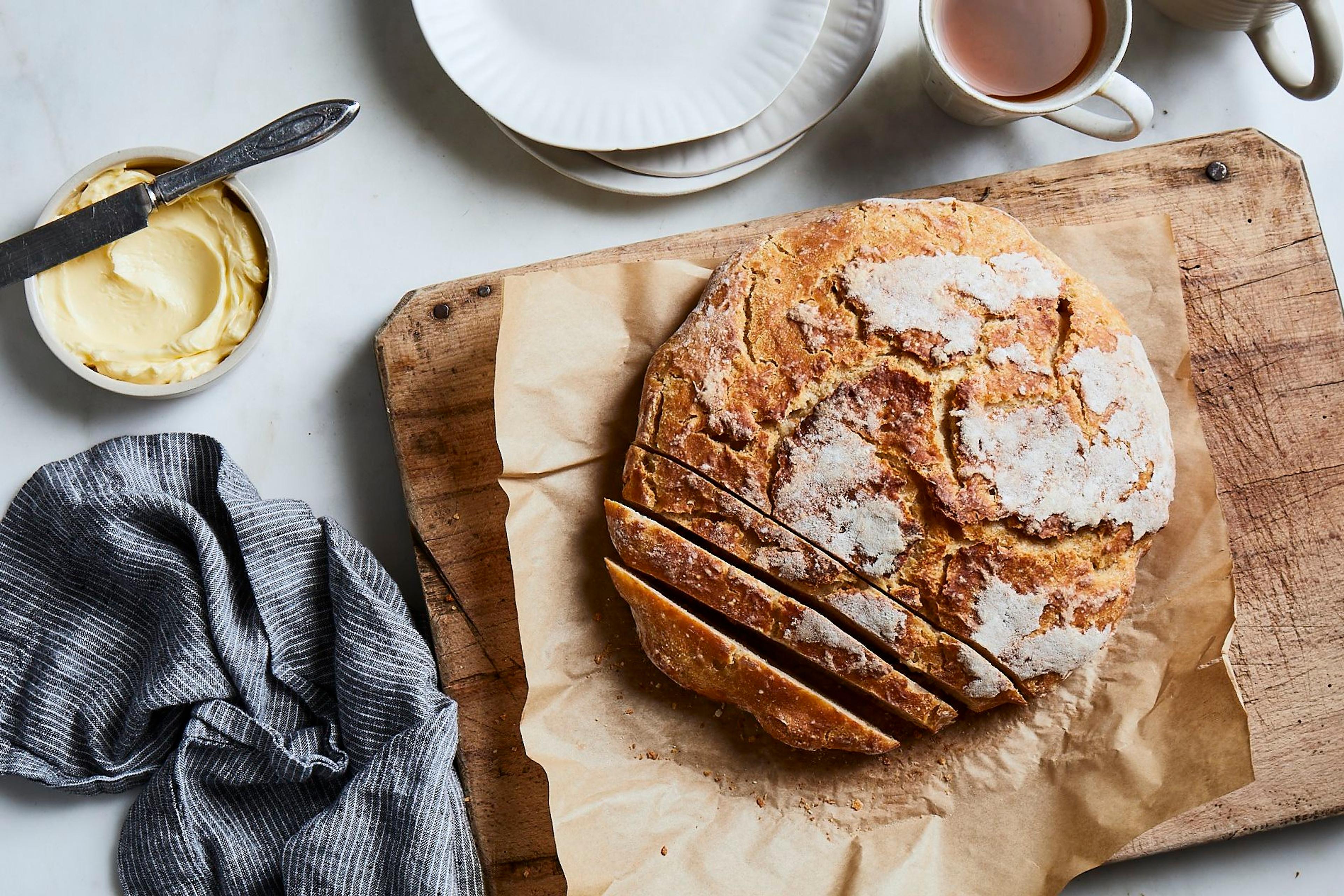 A perfectly browned, crusty loaf of sourdough bread