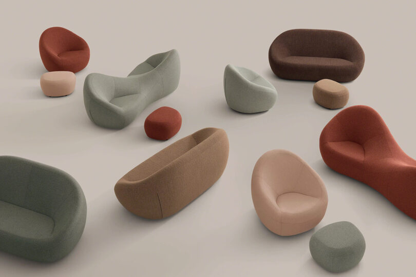 A collection of modern curved sofas and armchairs in muted earth tones on a light background.