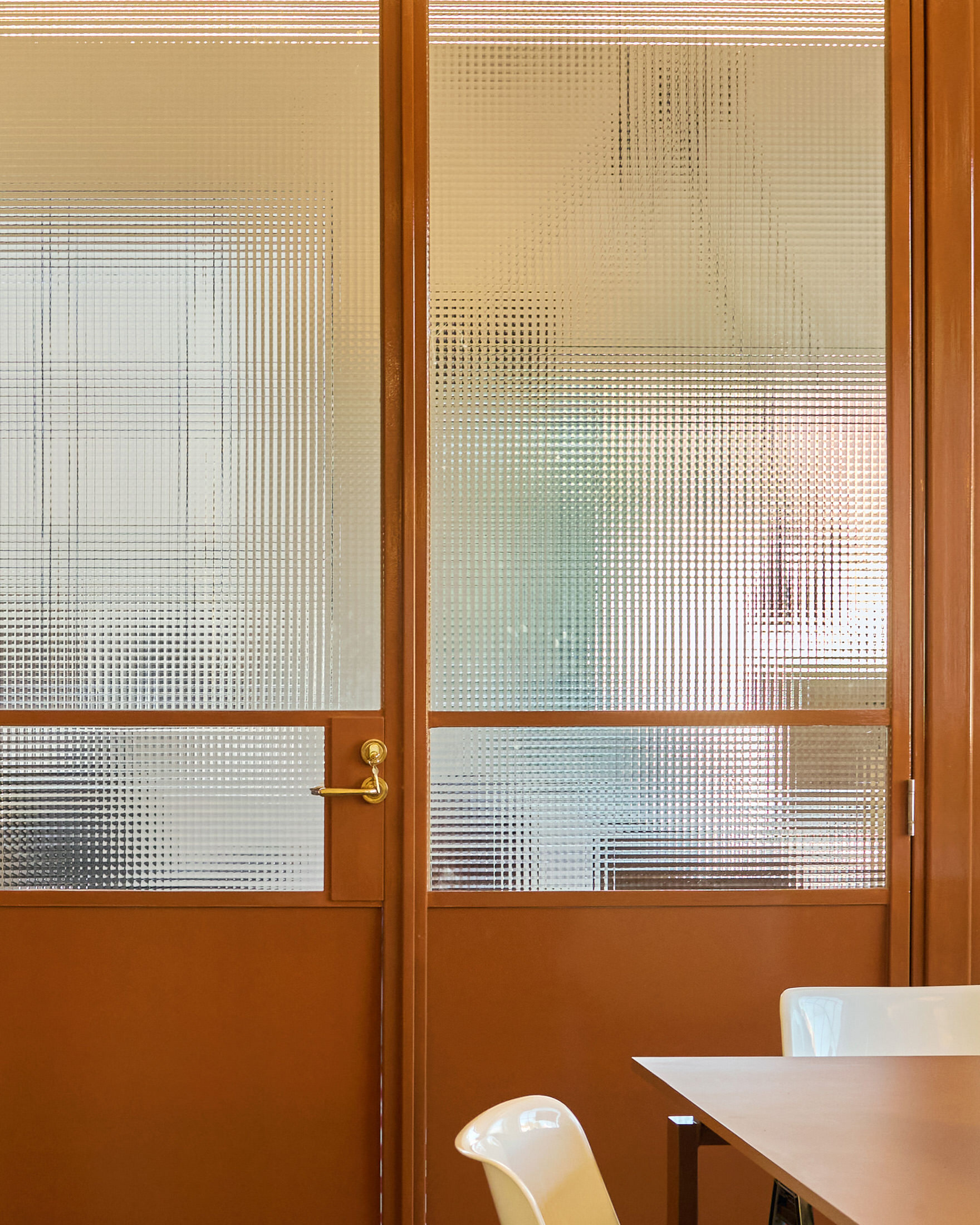 A wide view of the Two Birds Talking office showing the open-plan layout and high ceilings.