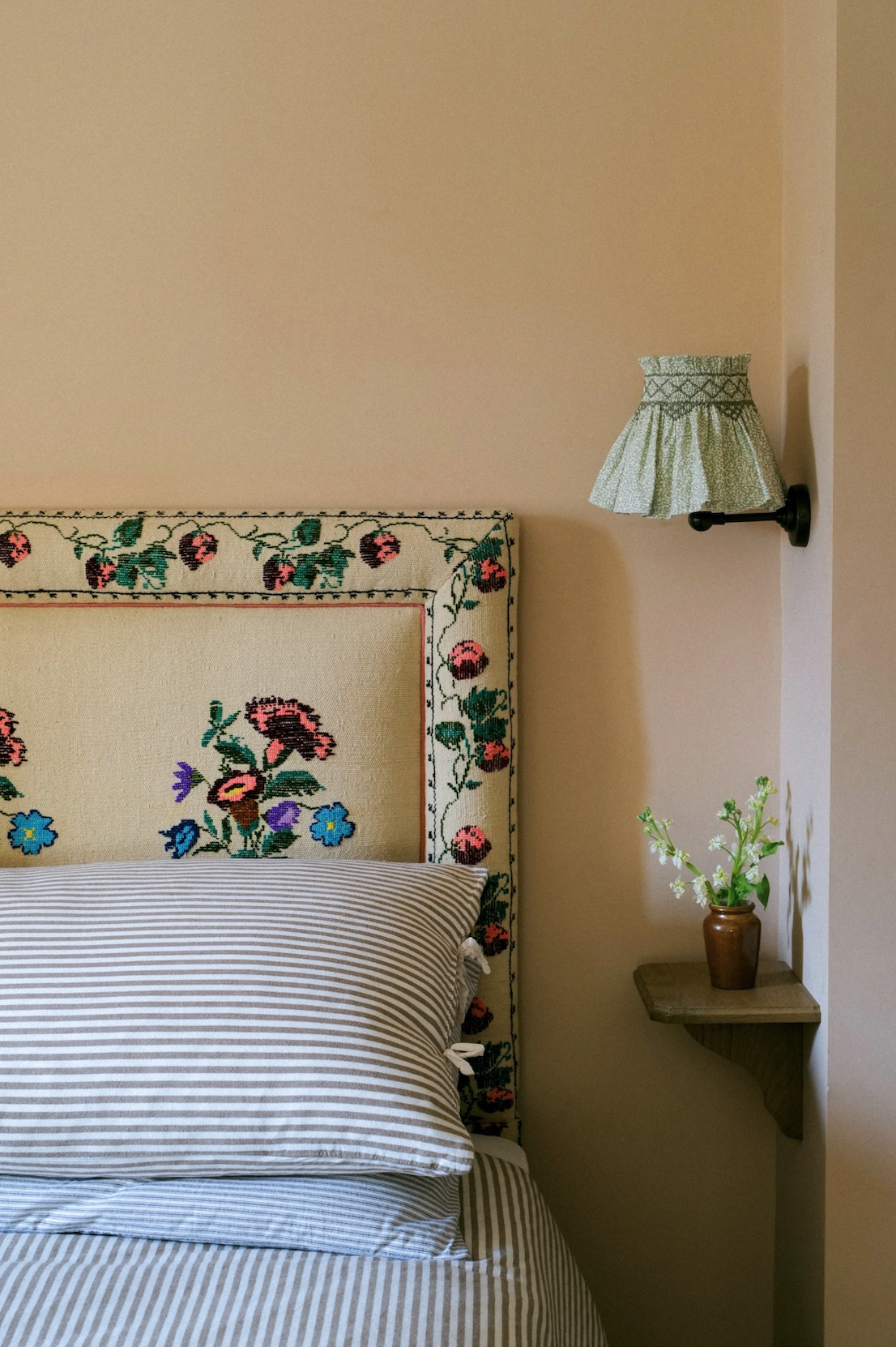 Close-up of a mini weave skirt shade showing intricate hand-stitched pleating.