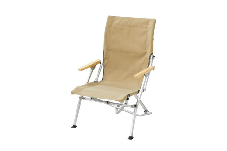 Snowpeak Low Beach Chair with natural wood armrests and canvas seat.