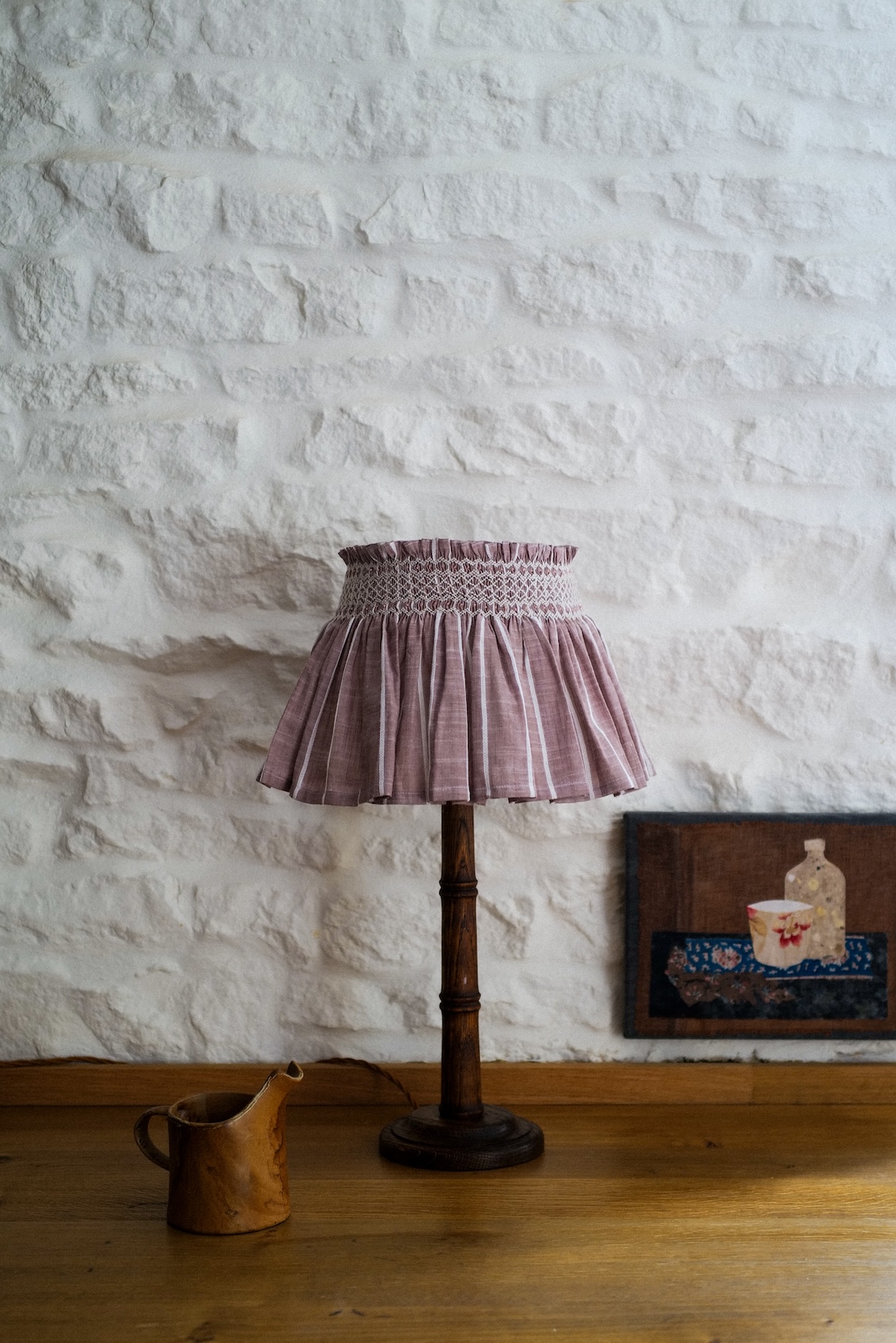 A Maxi Skirt Shade in Mink color with a Rosebud Trellis smocking pattern.