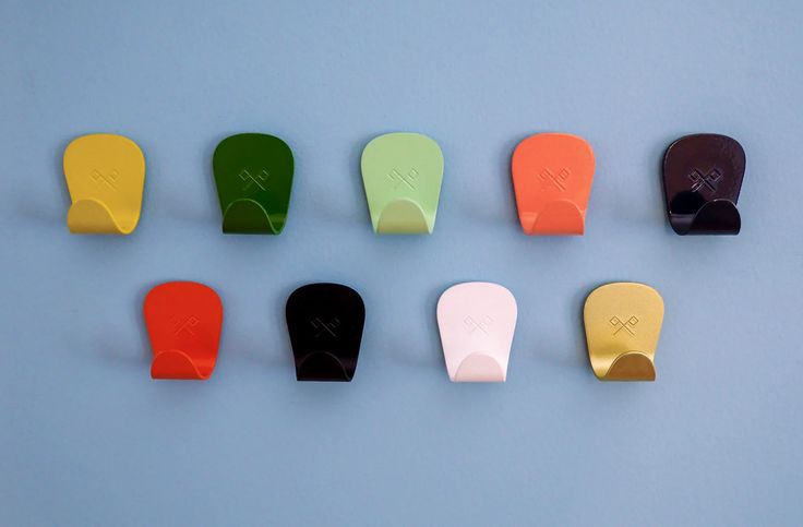 A grid of SR Anywhere Hooks in eight different colors including red, blue, and anodized brass.
