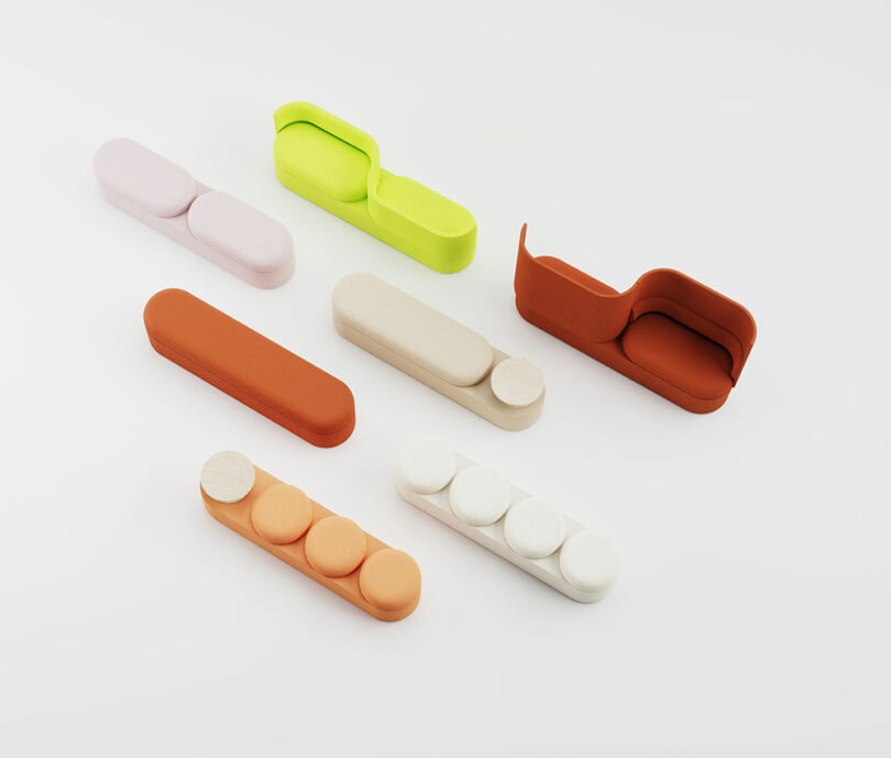 A collection of seven different Tate modular sofa models in various colors and geometric shapes.
