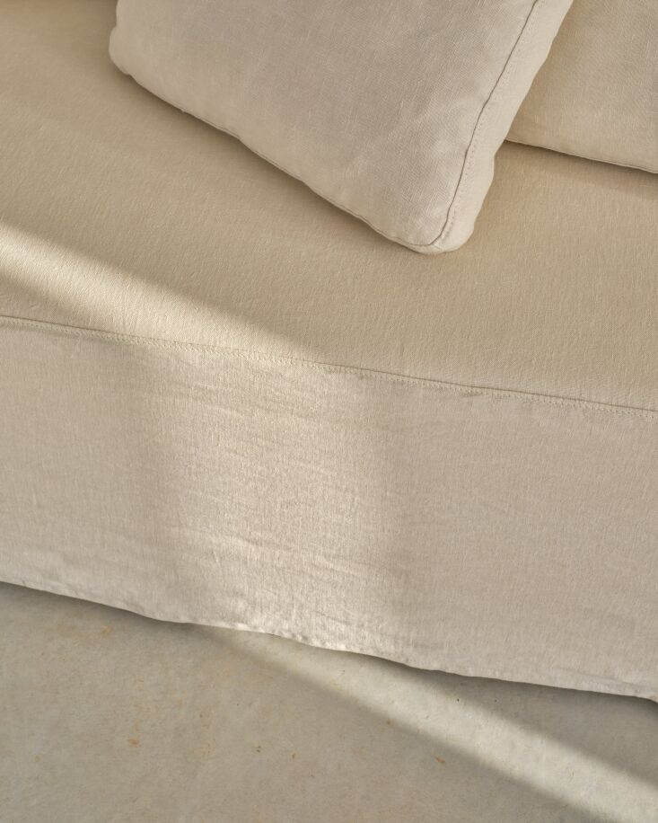 Close-up detail of the hand-stitched linen and upholstery work on a Henderson Jayne sofa.
