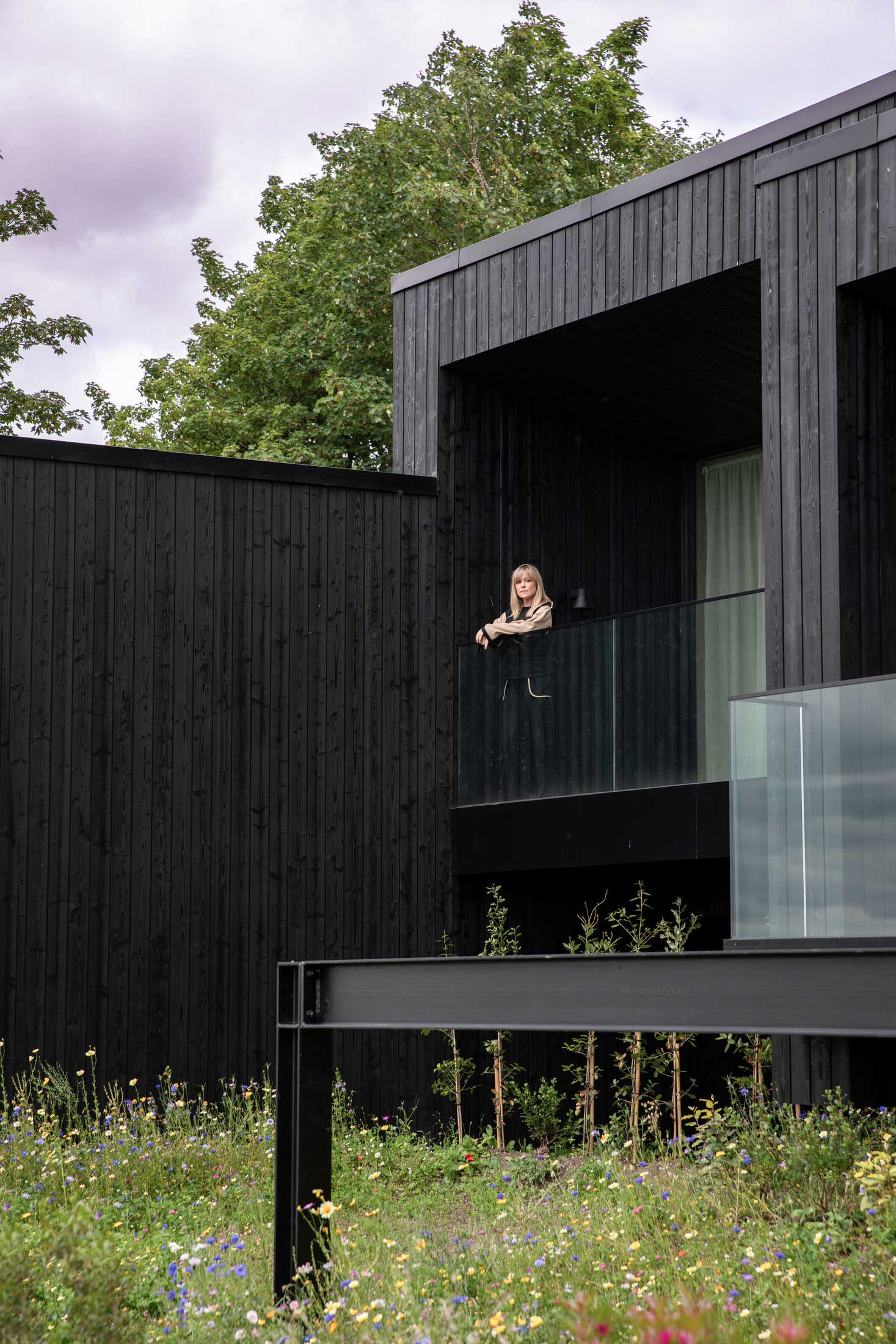 Modern timber suite architecture highlighting the blend of historic gardens and contemporary biophilic design.