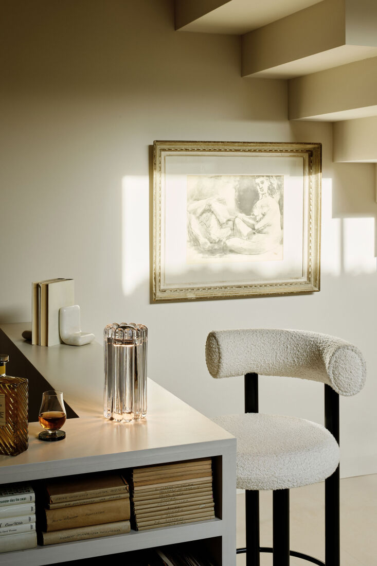 Tom Dixon Press Table Lamp made of thick glass bands with a gold metal cap.