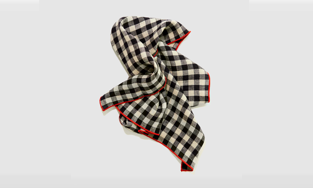 The Legume linen napkin by Madre, featuring a black-and-white color palette inspired by black-eyed peas.