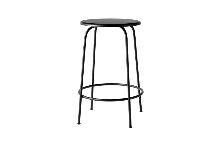 A deconstructed minimalist Afteroom Stool in black finish.