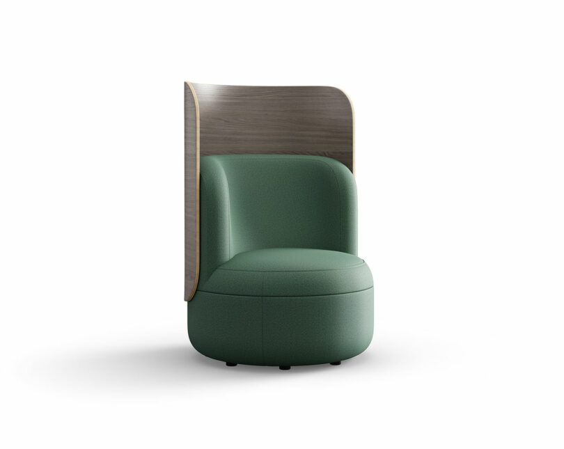 A green upholstered chair featuring a tall, curved wooden panel for acoustic shielding.