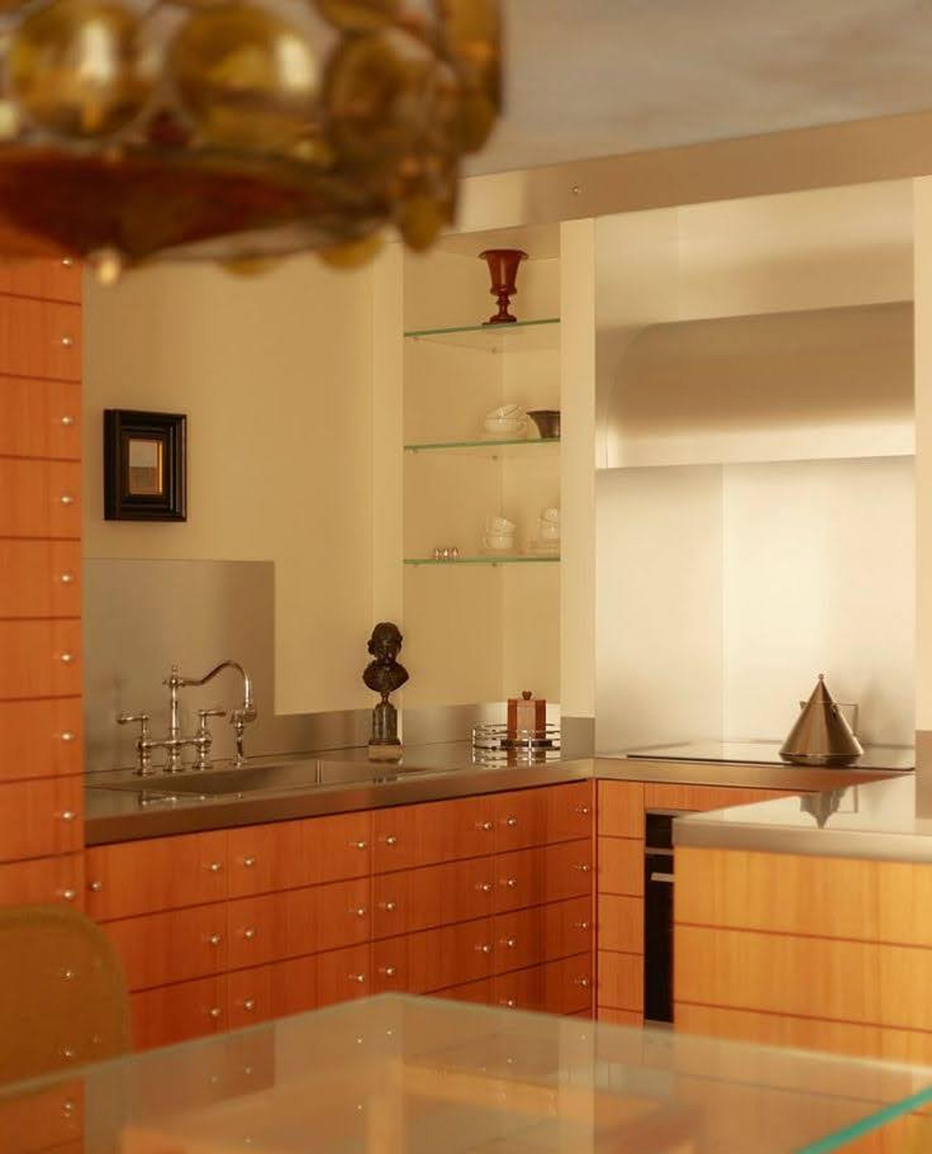 A modern kitchen featuring clean cabinetry and minimalist hardware integration.