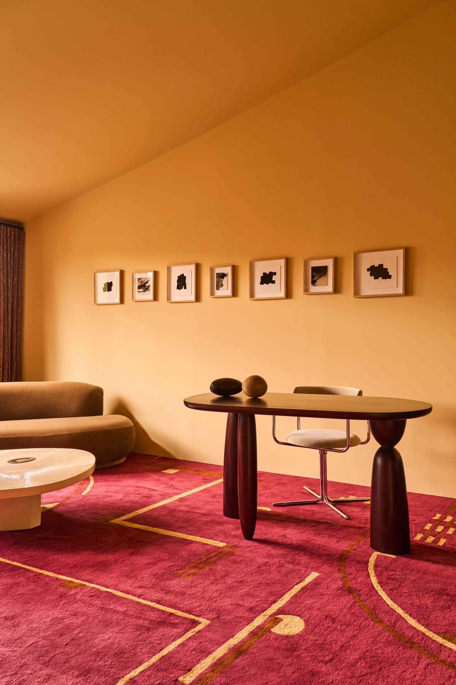 A quiet, recessed seating area designed for focused work or private calls.