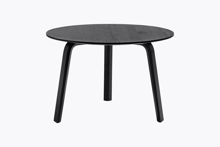 The HAY Bella Coffee Table in black with three slim legs and a thin round top.