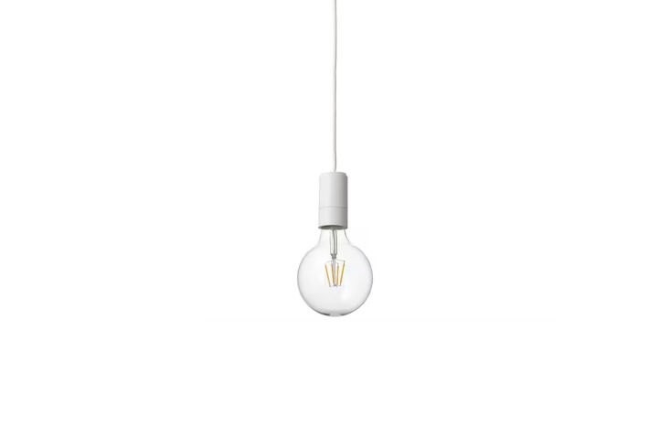 Simple IKEA Sunneby pendant cord with a decorative large LED bulb.