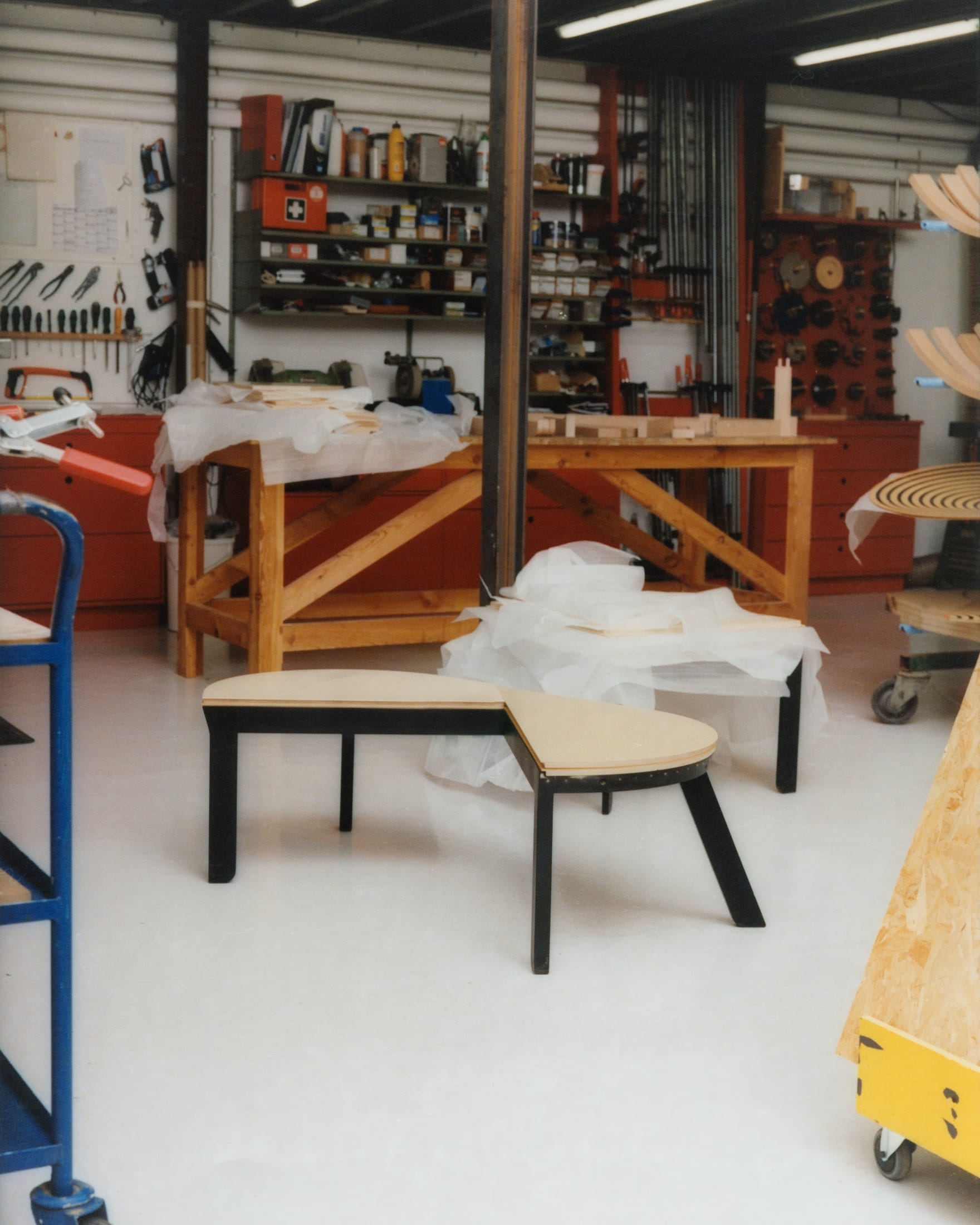 A styled interior scene featuring the Bench for Two paired with its companion low table.