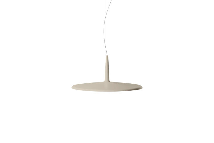 A sleek, beige minimalist pendant light with a very thin disc profile.