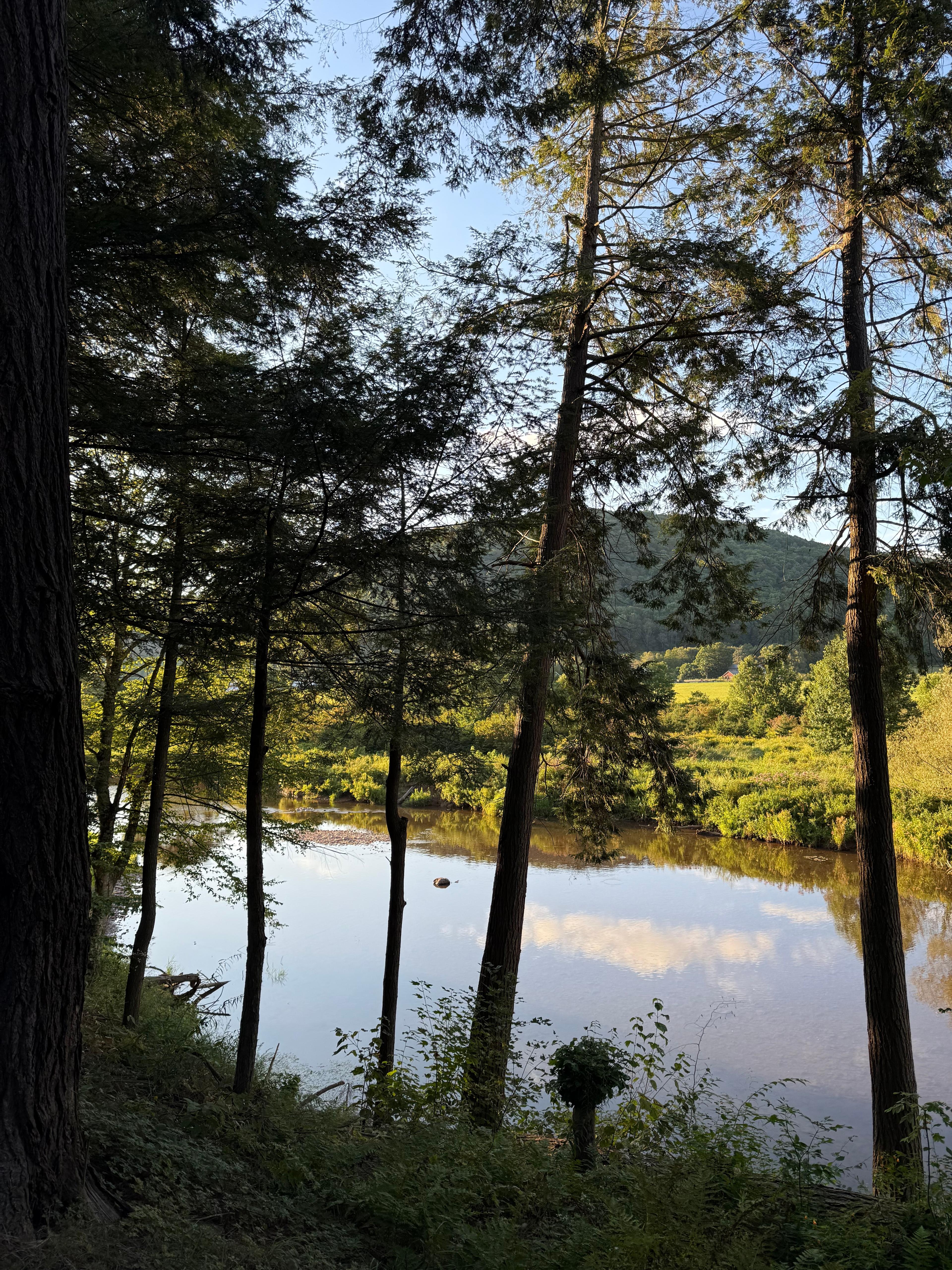 An expansive fall mountain landscape highlighting the rugged terrain.