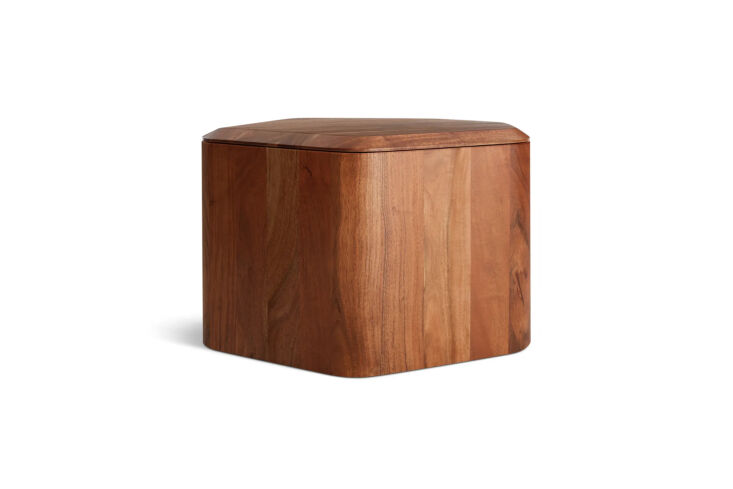 A round acacia wood side table with a removable beveled top.