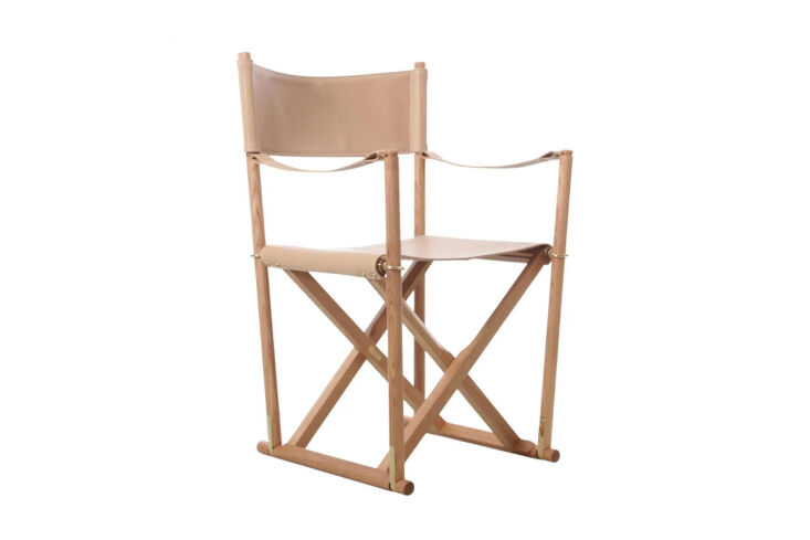 The Mogens Koch Folding Chair made of oil-treated beech and mahogany with natural canvas.