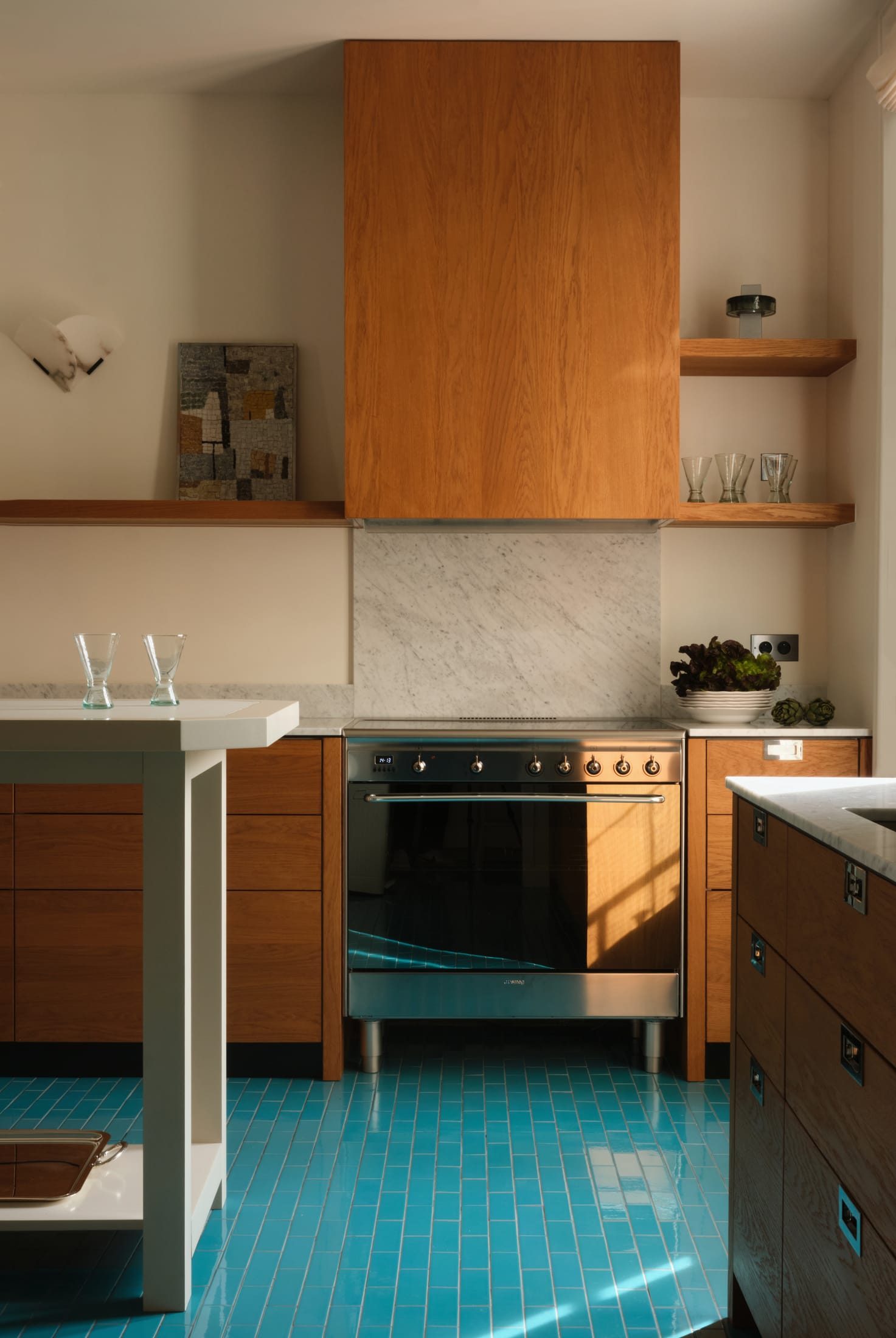 A cozy interior nook with wood paneling, soft lighting, and earthy textiles.