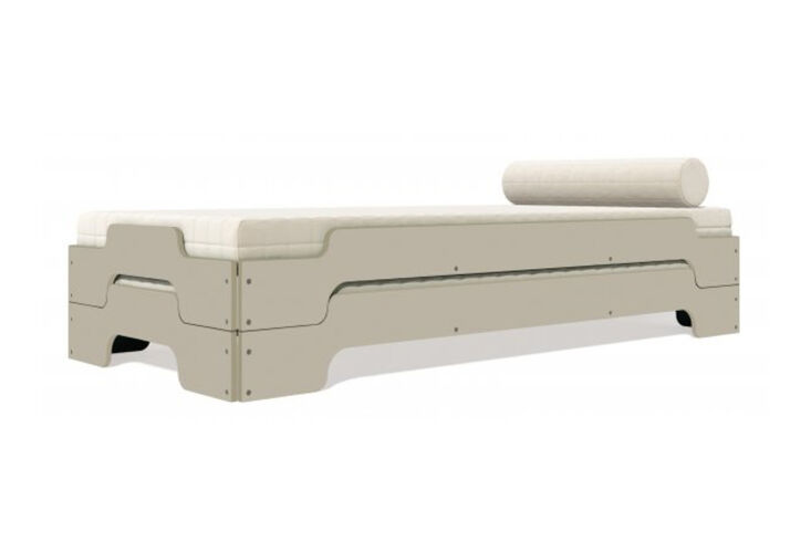 The classic Müller Stacking Bed by Rolf Heide in a natural plywood finish.