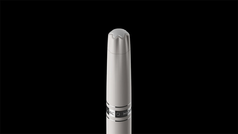 A silver and black marker with a chisel tip designed for the Montblanc digital system.