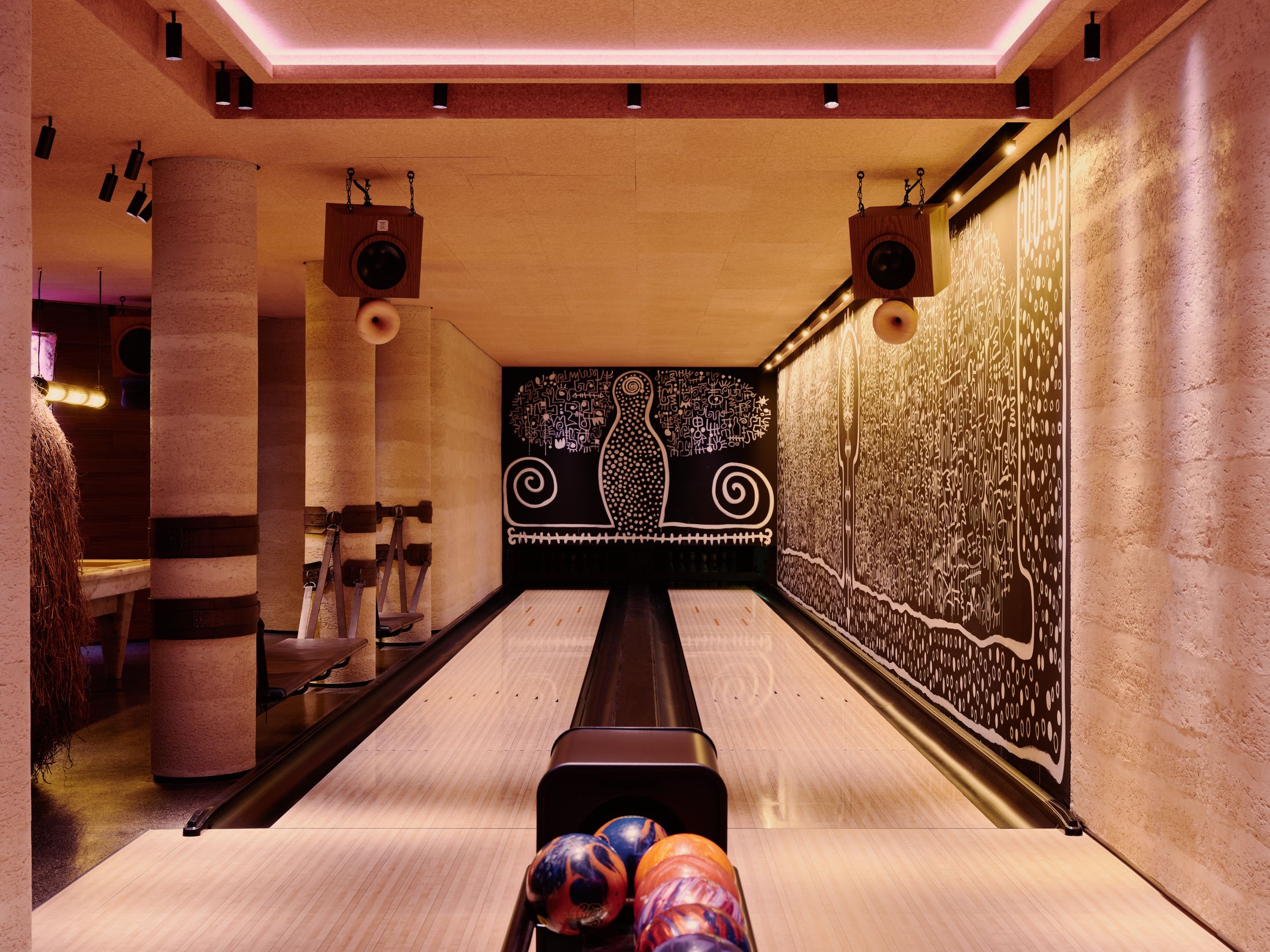 Close-up of industrial yet warm interior materials and cabinetry details.