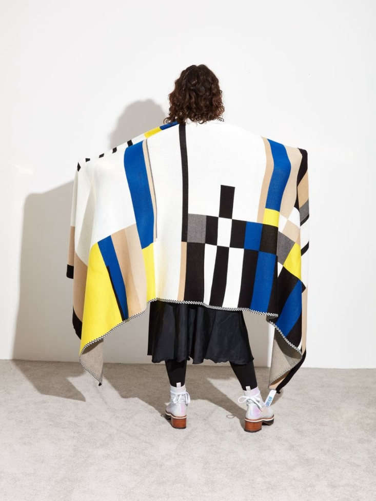 A geometric patterned throw blanket designed by Bogus Studio.