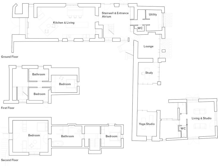 Architectural elevation drawing showing the three-story structure and modern extensions.