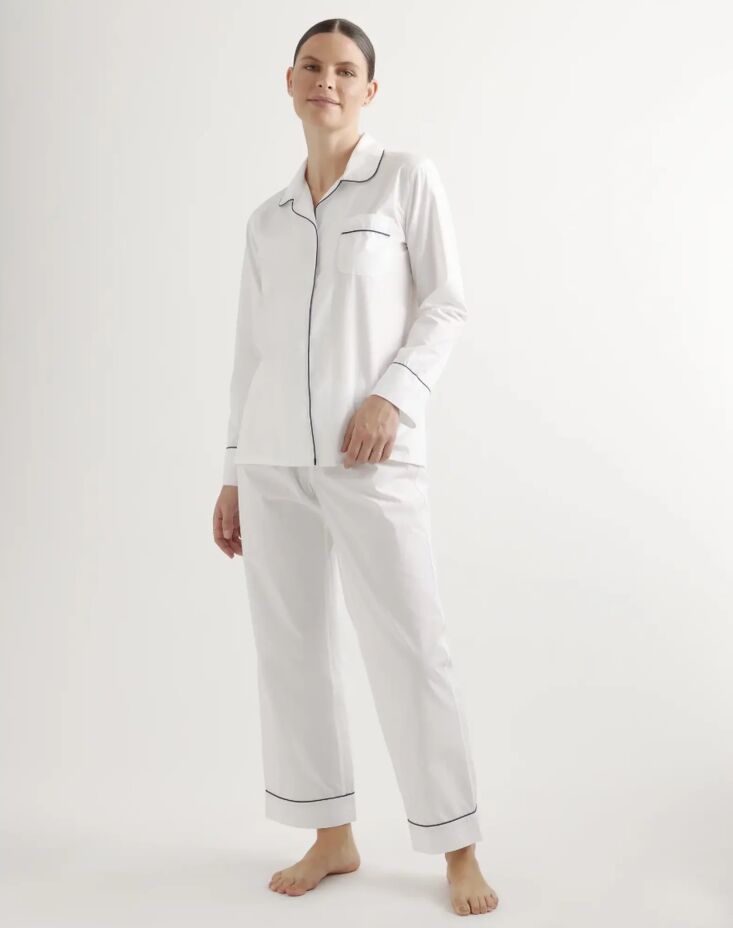 A folded white 100 percent cotton pajama set from Quince.