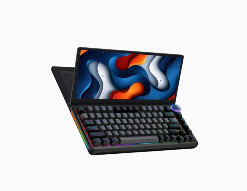 Close-up of the Aura KeyView showing the mechanical keys, RGB lighting, and the top-right control knob.