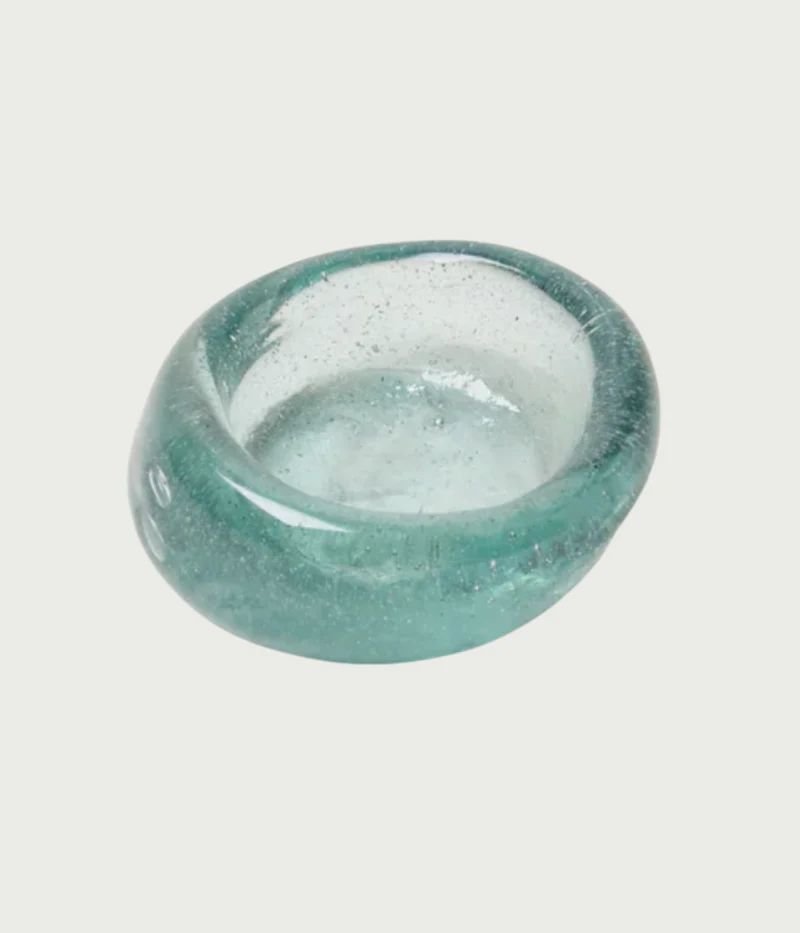 Plated slow-roasted cod garnished with fresh dill and olives.