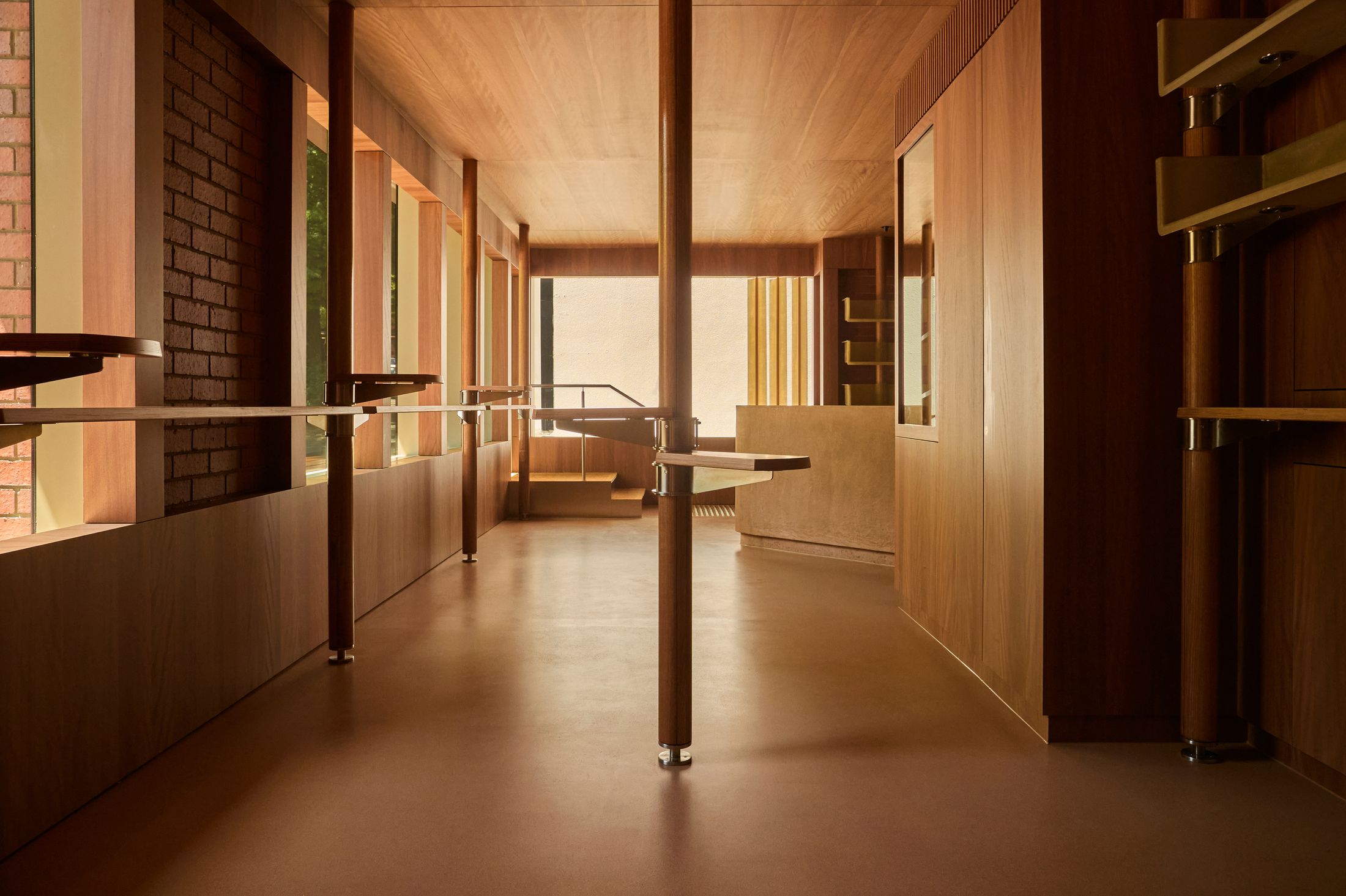 Detail shot showing the juxtaposition of industrial fiberglass elements and natural wood textures.