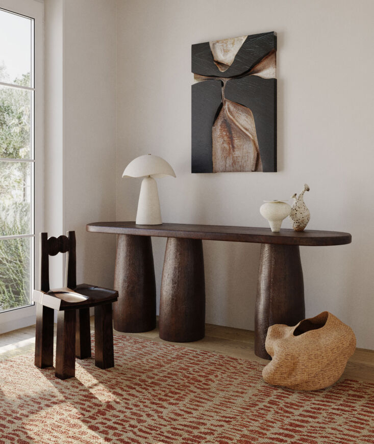 Loft & Thought ceramic Soloma Table Lamp with a delicate wavy-edged shade.
