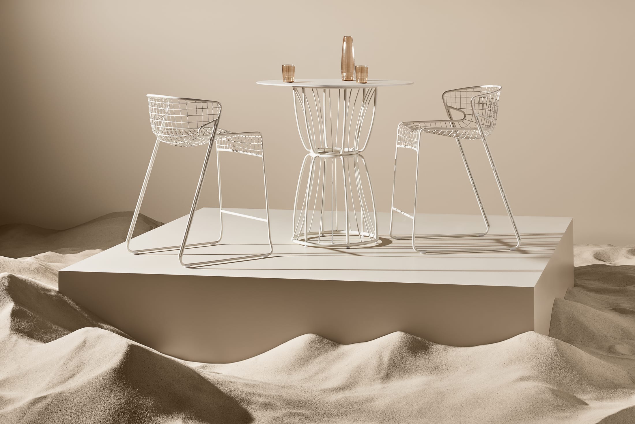 Side profile of a black latticed chair showing its curved, fanned-out backrest.