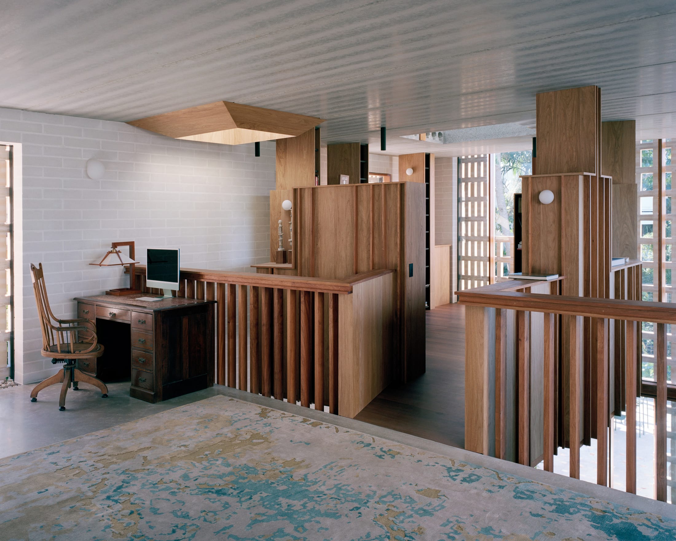 View of the thick masonry walls and sculptural volumes of the Mount Coot-tha residence.