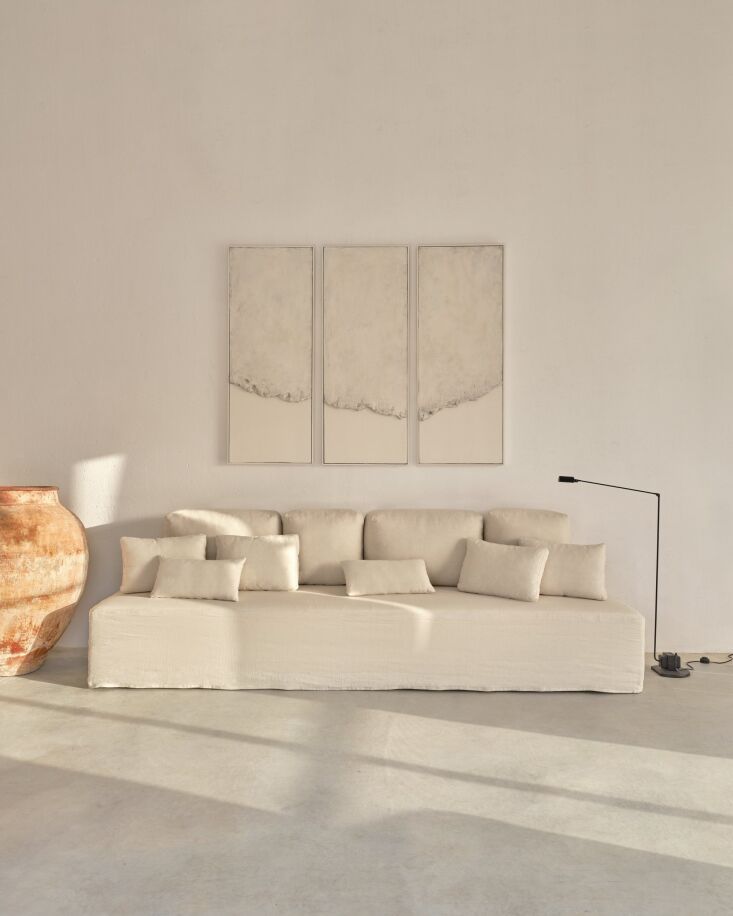 The Ceglie Sofa featuring deep cushions and a structured yet organic frame.