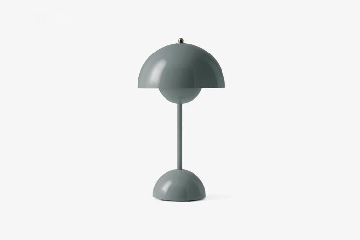 Stone Blue &Tradition Flowerpot VP9 portable lamp on a table.