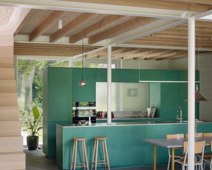 Modern kitchen with custom cabinetry made of sustainable Valchromat MDF.