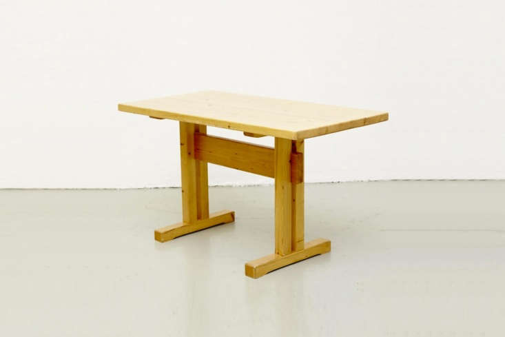 A rustic 1960s Modernist pine table by Charlotte Perriand.